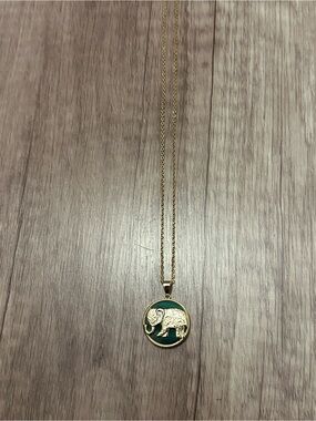 Gold Elephant Pendant Necklace with Green Enamel